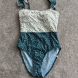 The Ruffle Oasis summersalt green and white one piece suit